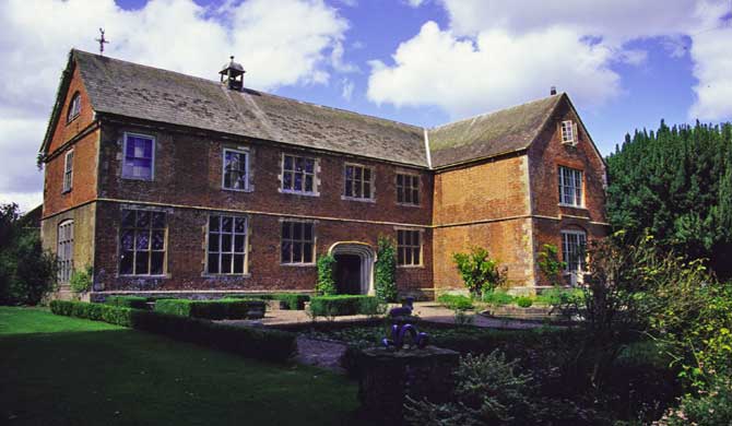 The red brick Hellens House.